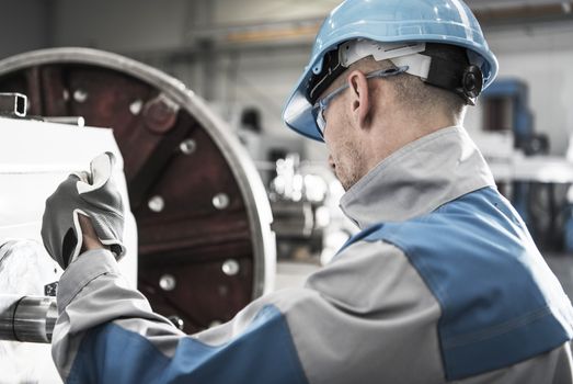 Caucasian Lathe Operator. Metalworking Industry Concept Photo.