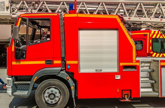 Red Firetruck on Duty Somewhere in France, Europe. 