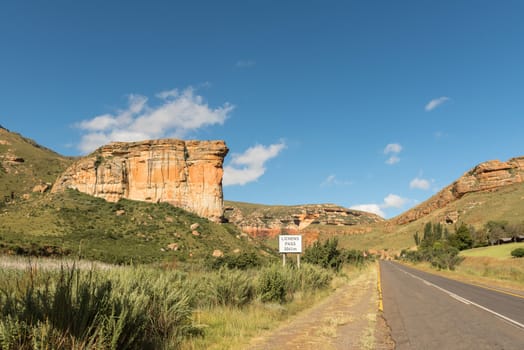 Start of the Lichens Pass while the Brandwag (sentinel)  guards the entrance to Golden Gate in the Eastern Free State