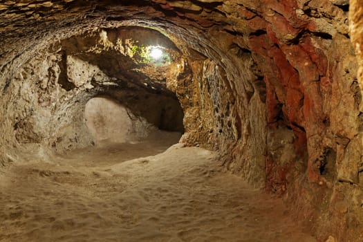 The Derinkuyu underground city is an ancient multi-level cave city in Cappadocia, Turkey.