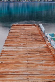 Old wooden pier in the sunset on Mediterranean sea