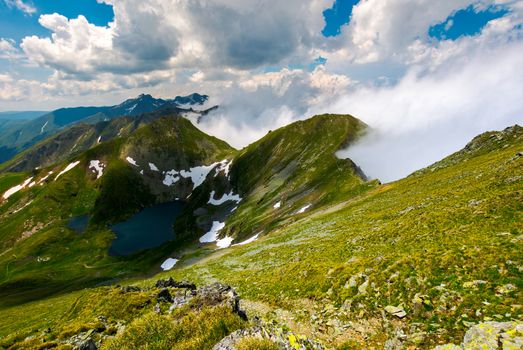 lake Capra view from Saua Vaiuga. beautiful summer landscape of Fagarasan mountains, Romania