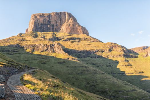 The view at sunrise of part of the Sentinel Trail to the Tugela Falls in the Drakensberg. The Sentinel is in the back