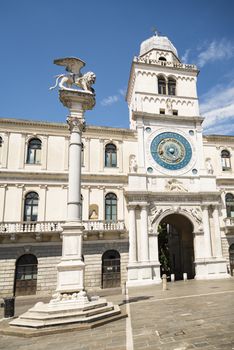 The facade of old Palazzo del Podesta in the city center in Padova, Italy