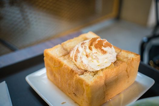 Korean styled cinnamon and butter toast with cream.