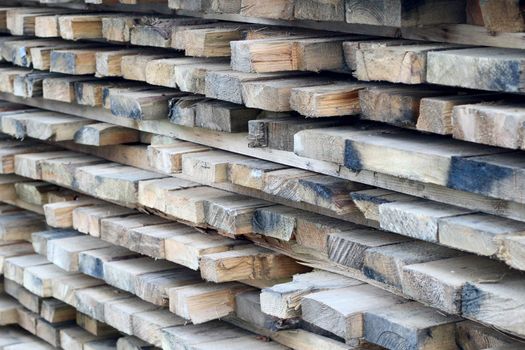 stack of wooden boards for construction. photo