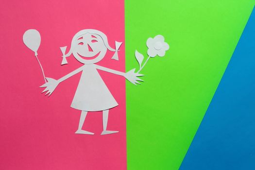 background of colored cardboard. the girl is made of white paper. in the style of a funny cartoon.