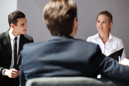 Business people at coffee break talking to each other