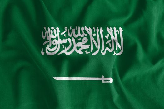 Saudi Arabia flag painting on high detail of wave cotton fabrics . 3D illustration .