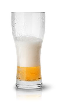 Few beer in sweaty glass isolated on white background