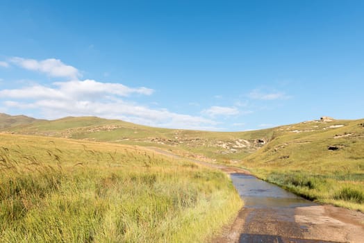 The road to Langtoon dam at Golden Gate in the Free State Province of South Africa