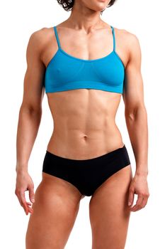 Fitness woman posing against a white background, isolated