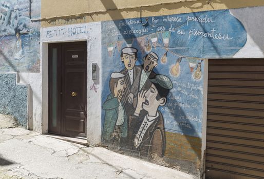 Orgosolo,Italy, 6 April 2018 :Murales in Orgosolo Italy Since about 1969 the wall paintings reflect different aspects of Sardinia's political struggles and international issues