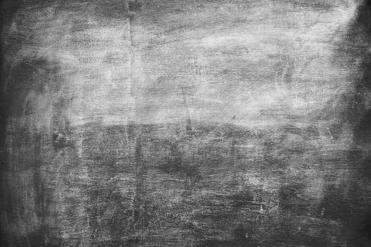 Dark and grungy concrete wall texture with retro faded look