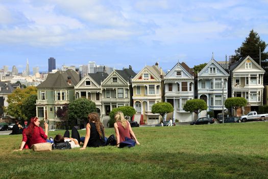 San Francisco, California, USA - September 12, 2013 : group of young girls enjoying free time in the Alamo Square park, San Francisco, California. USA