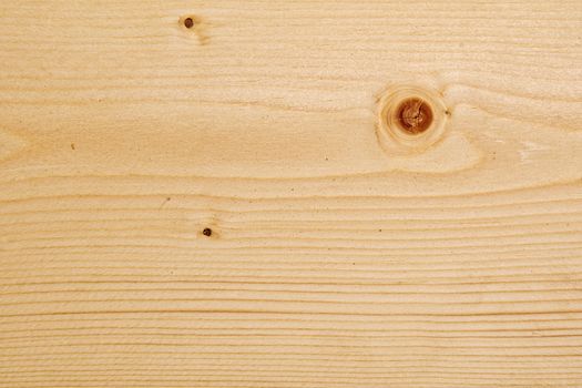 Wood texture with natural pattern. A fragment of a wooden panel