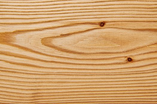 Wood texture with natural pattern. A fragment of a wooden panel