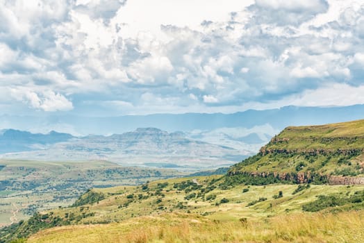 The view from the top of the Oliviershoek Pass into Kwazulu-Natal towards the South with the Drakensberg visible in the back