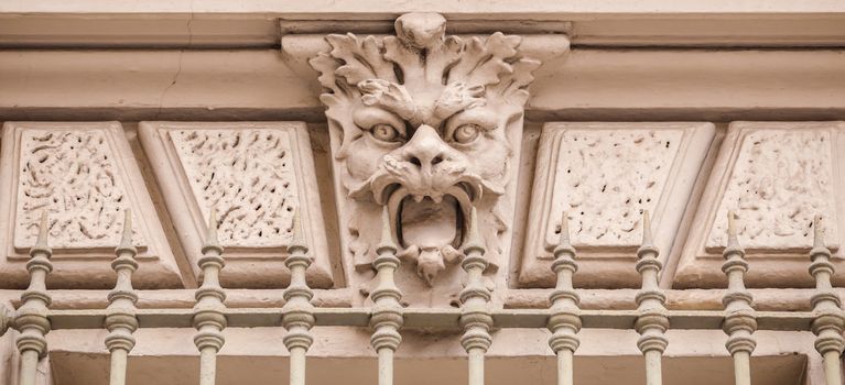 Italy, Turin. This city is famous to be a corner of two global magical triangles. This is a protective mask of stone on the top of a luxury palace entrance, dated around 1800