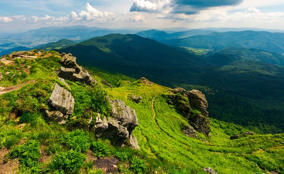 rocky cliff over the valley. beautiful mountain landscape in summer