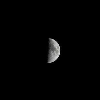 Waxing Moon,square orientated image with Moon isolated on black background with text or copy space.