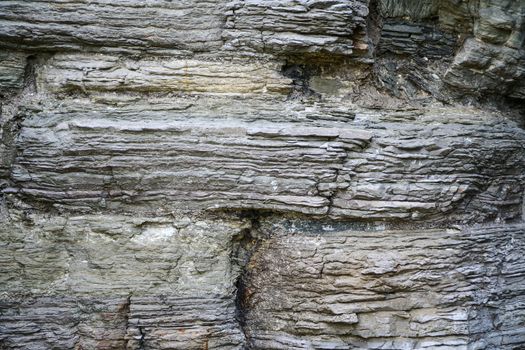 Old stonewall fragment of medieval castle. Close up view