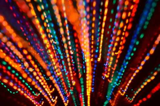 Multi-colored explosion of lights. Tunnel effect wallpaper