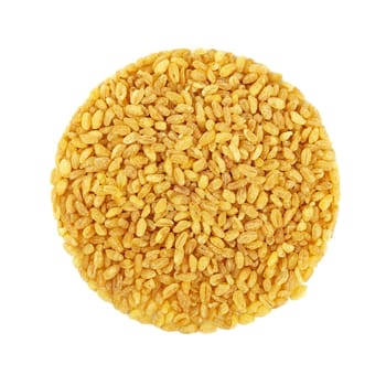 Round shaped yellow traditional bulgur (bulghur, burghul) big grains of durum wheat, isolated on white background, close up, elevated top view