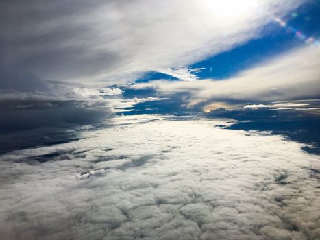 nice picture from the plane with clouds and sky