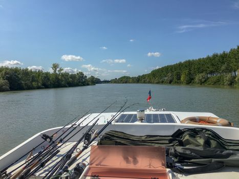 fishhing with the boat in a rivier at venice in summer