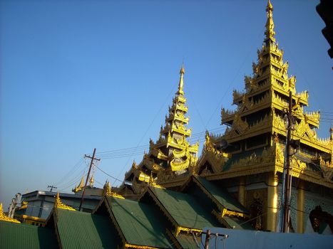 a temple in burma with golden roof