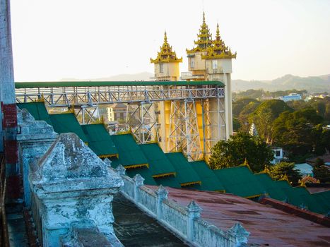 a temple in burma with golden roof