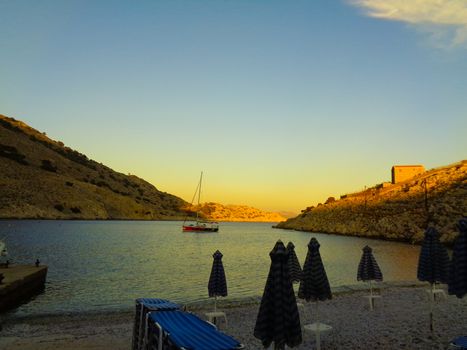 sunset at the bay with boats