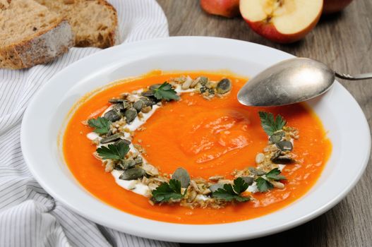  A wipe of pumpkin-apple soup with a tender, soft consistence,  yoghurt  and seasoned with pumpkin seeds and sunflower seeds. This is what you need for those who watch their health.