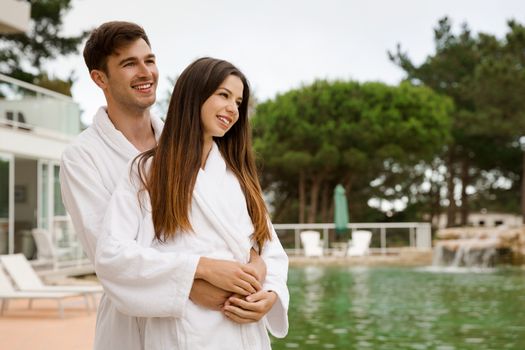 Young couple enjoying vacations in a hotel