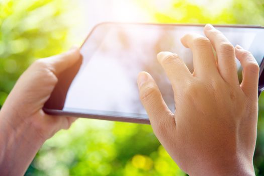 close up image of using digital tablet,Doing business the modern way concept background