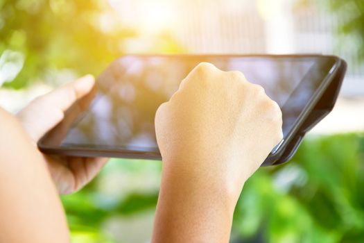 close up image of using digital tablet,Doing business the modern way concept background