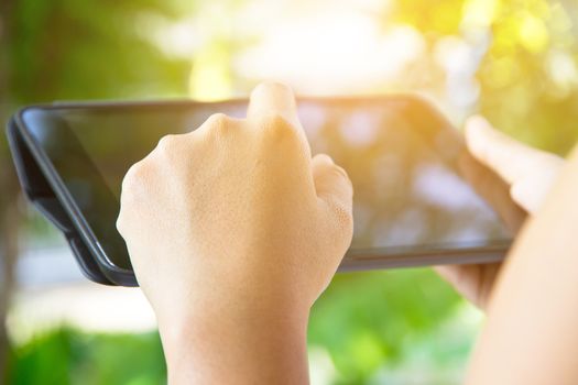 close up image of using digital tablet,Doing business the modern way concept background