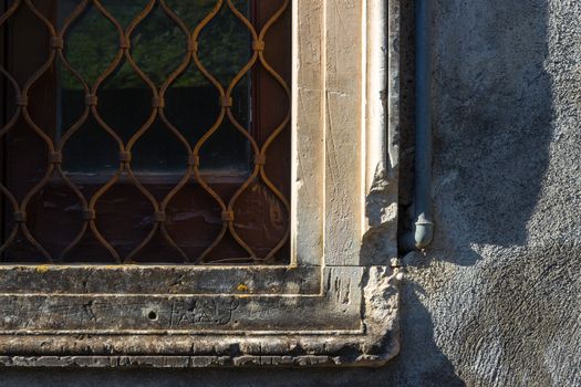 The very old sicilian houses and street. Detail window