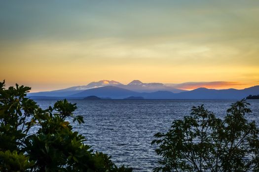 Taupo Lake and Tongariro volcano landscape at sunset, New Zealand