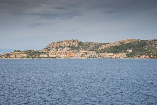 skyline of the island maddalena with the city la maddalena seen from the ferry from sardinia tyo the island