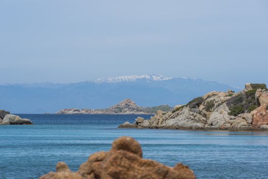 the beautiful island of maddalena , compared with the maledives, with blue sea and the mountains as background, you travel here by ferry from palau