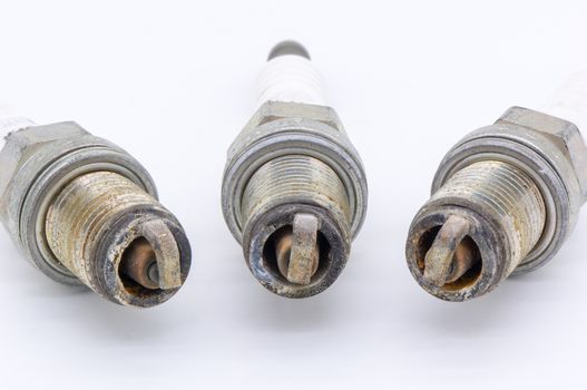 Old spark plug isolated on the white