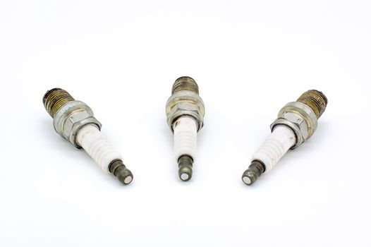 Old spark plug isolated on the white