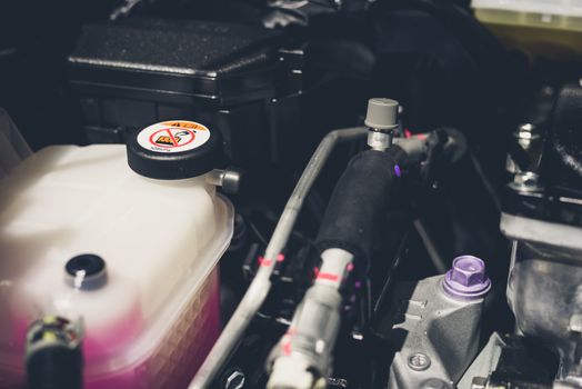 Coolant tank and warning information in engine room