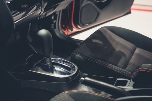 Automatic gear stick inside modern car for background