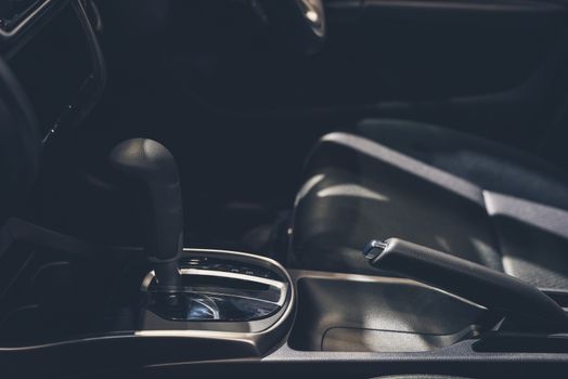 Automatic gear stick inside modern car for background