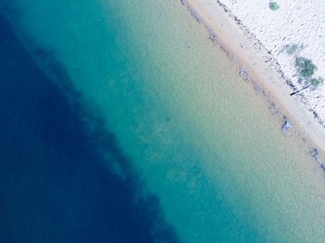 Early morning views top down perspective showing the lovely pristine aqua blue water of Ettalong beach Australia