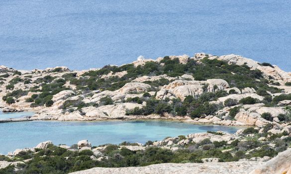 bay with blue water onm ths island of maddalena, you reach the island with the ferry from palu on sardinia