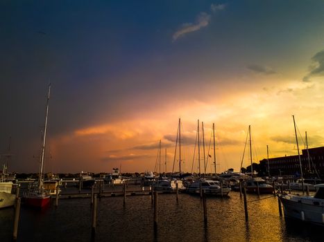 sunset at the pier in venice with the boats